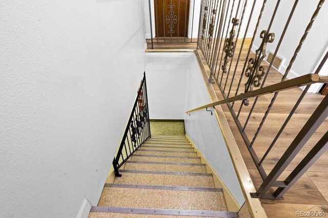 1903 Northmoor Ter, Pueblo, CO 81008 - staircase featuring baseboards