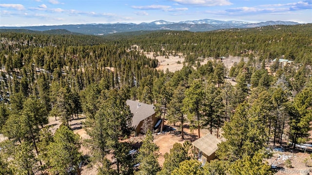 174 Needle Creek Rd, Divide, CO 80814 - drone / aerial view of a heavily wooded area and a mountainous background