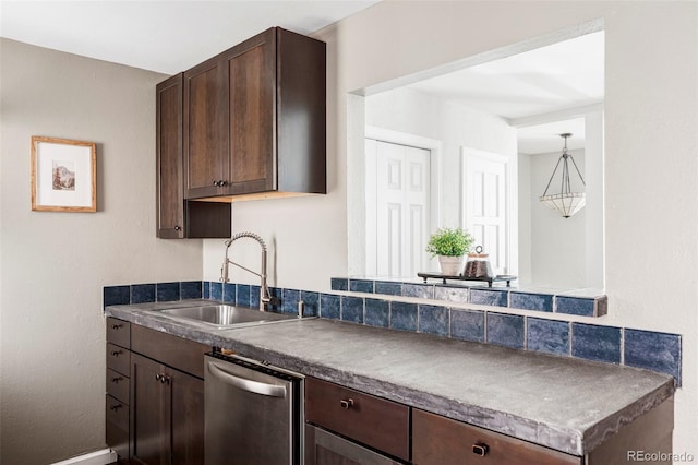 377 Pearl St Unit 5, Boulder, CO 80302 - kitchen with stainless steel dishwasher, dark brown cabinetry, and dark countertops