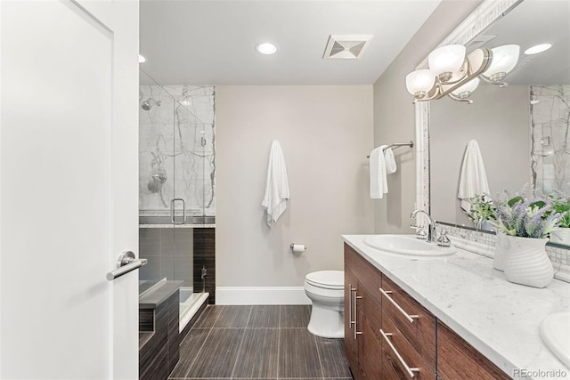2001 Lincoln St Unit 2524, Denver, CO 80202 - full bath with baseboards, a stall shower, toilet, double vanity, and recessed lighting