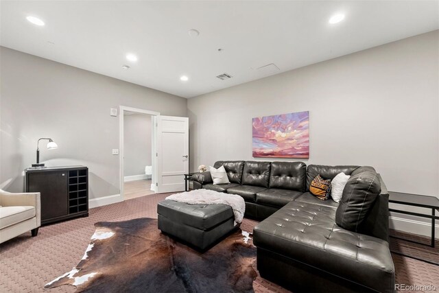 2001 Lincoln St Unit 2524, Denver, CO 80202 - carpeted living area with baseboards and recessed lighting