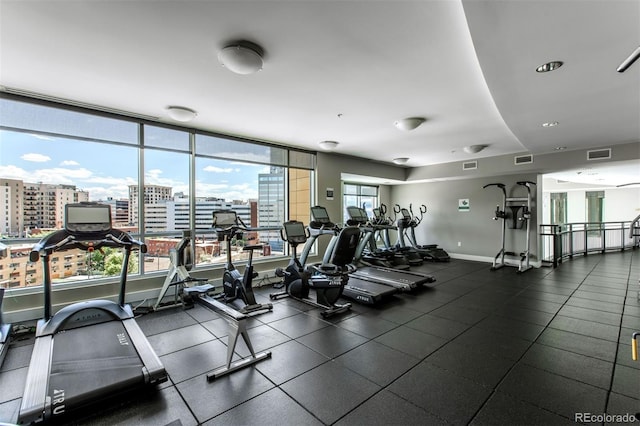 2001 Lincoln St Unit 2524, Denver, CO 80202 - gym featuring a view of city and baseboards