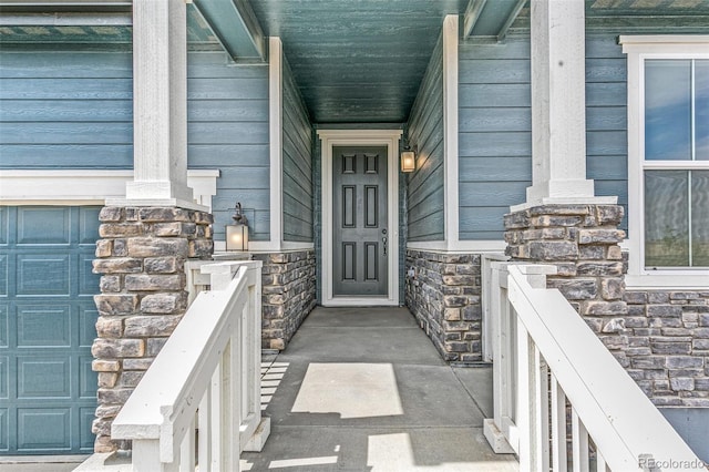 doorway to property featuring a garage