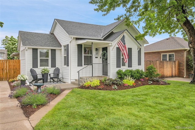 2212 Ingalls St, Edgewater, CO 80214 - view of front of home featuring roof with shingles