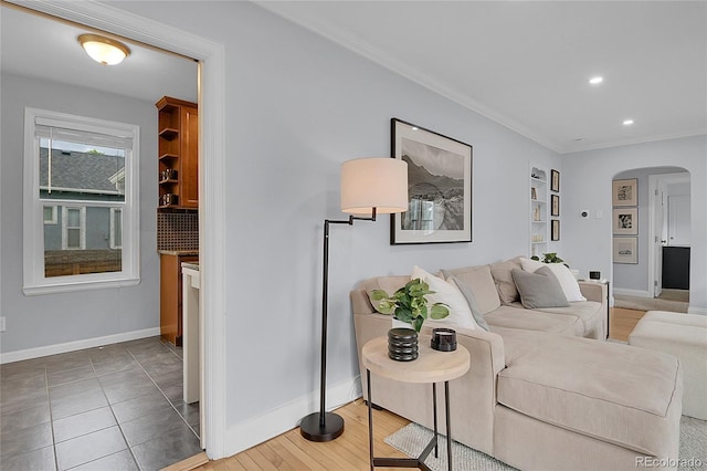 2212 Ingalls St, Edgewater, CO 80214 - living room with arched walkways, ornamental molding, recessed lighting, and wood finished floors