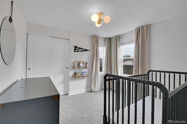 2212 Ingalls St, Edgewater, CO 80214 - bedroom with carpet floors, a closet, and a nursery area