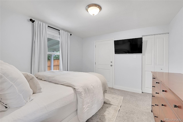 2212 Ingalls St, Edgewater, CO 80214 - bedroom featuring carpet floors and a closet