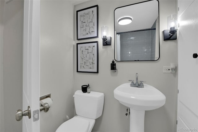 2212 Ingalls St, Edgewater, CO 80214 - full bathroom with toilet and a shower with curtain