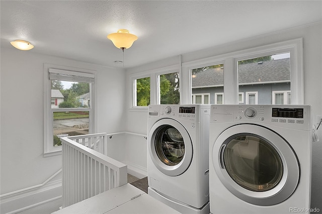 2212 Ingalls St, Edgewater, CO 80214 - washroom with washer and clothes dryer