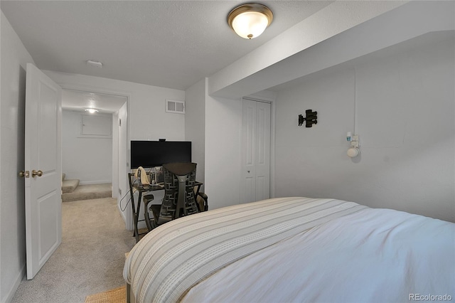 2212 Ingalls St, Edgewater, CO 80214 - bedroom with light carpet and a closet