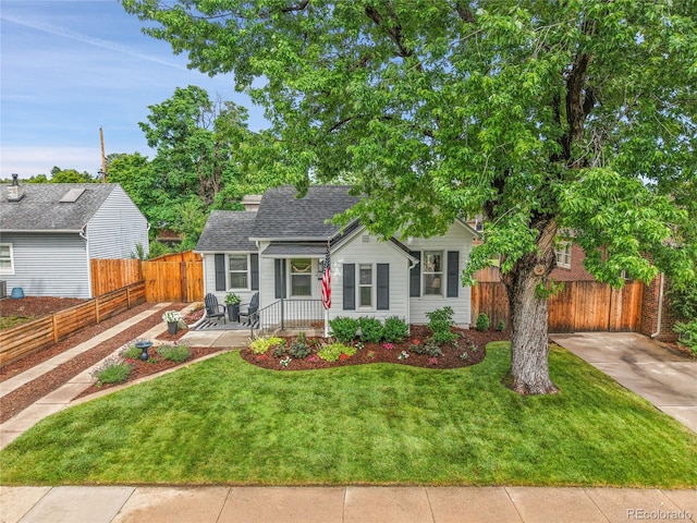 2212 Ingalls St, Edgewater, CO 80214 - view of front of home featuring a shingled roof