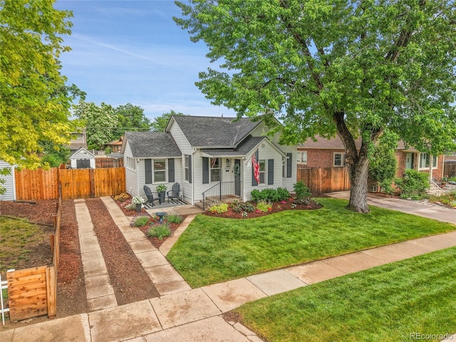 2212 Ingalls St, Edgewater, CO 80214 - view of front of house featuring roof with shingles