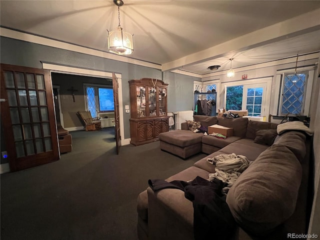 1069 US Highway 285, Monte Vista, CO 81144 - carpeted living area with baseboards