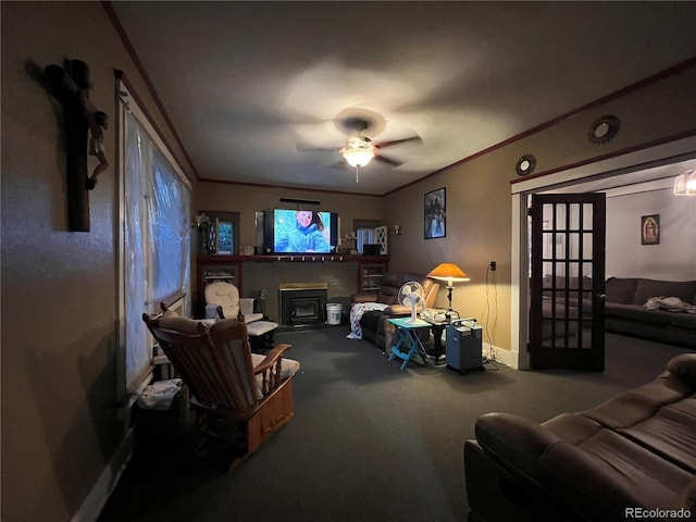 1069 US Highway 285, Monte Vista, CO 81144 - carpeted living room with ceiling fan, ornamental molding, and a glass covered fireplace