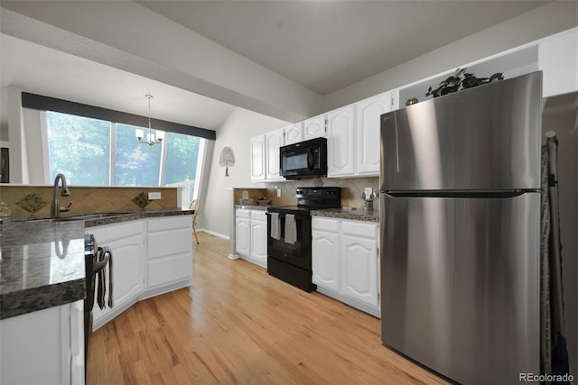 5283 Union Ct Unit 8, Arvada, CO 80002 - kitchen featuring black appliances, a sink, white cabinetry, and decorative backsplash