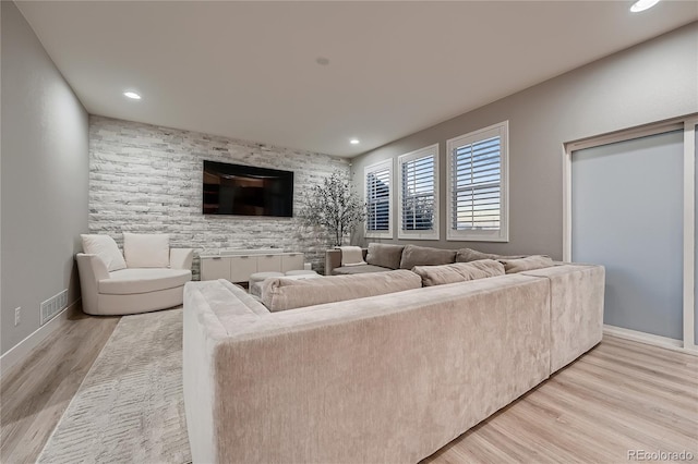 15595 E 47th Dr, Denver, CO 80239 - living area featuring light wood-style floors and recessed lighting