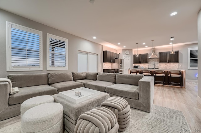 15595 E 47th Dr, Denver, CO 80239 - living area with recessed lighting and light wood-style flooring