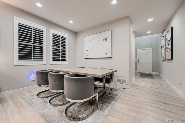 15595 E 47th Dr, Denver, CO 80239 - dining room featuring wood finished floors and recessed lighting