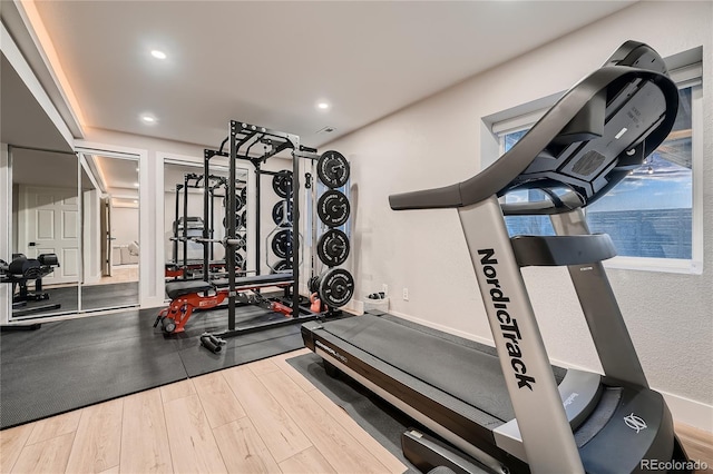 15595 E 47th Dr, Denver, CO 80239 - workout area with wood finished floors and recessed lighting