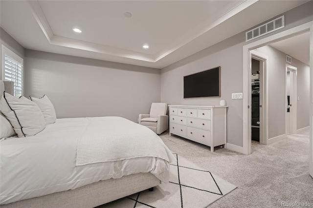 15595 E 47th Dr, Denver, CO 80239 - bedroom featuring light carpet, recessed lighting, and a raised ceiling