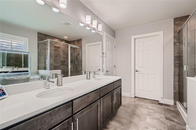 15595 E 47th Dr, Denver, CO 80239 - full bath with double vanity and a stall shower