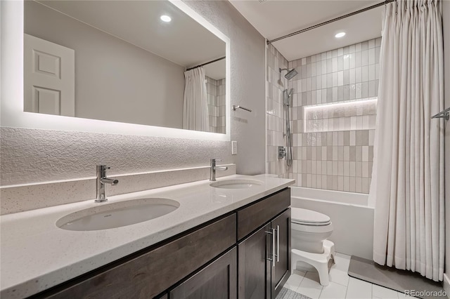 15595 E 47th Dr, Denver, CO 80239 - bathroom featuring shower / bath combo, double vanity, recessed lighting, and tile patterned floors