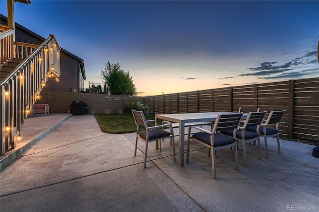 15595 E 47th Dr, Denver, CO 80239 - fenced backyard featuring outdoor dining space and a patio area