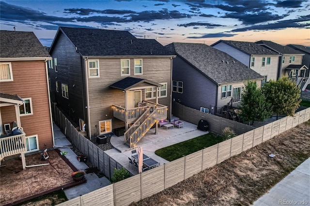 15595 E 47th Dr, Denver, CO 80239 - rear view of house featuring a patio, a fenced backyard, and a residential view