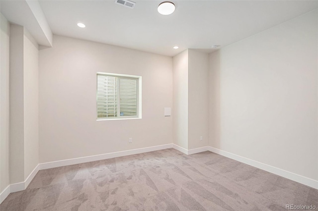 unfurnished room with carpet flooring