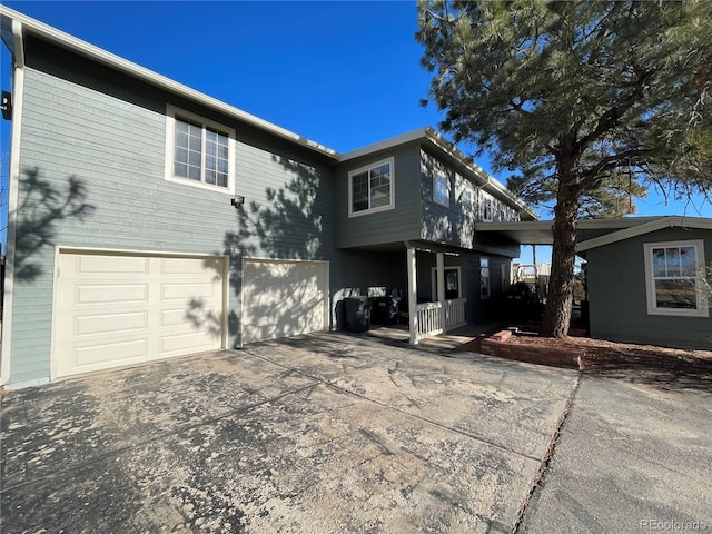 view of front facade featuring a garage and concrete driveway