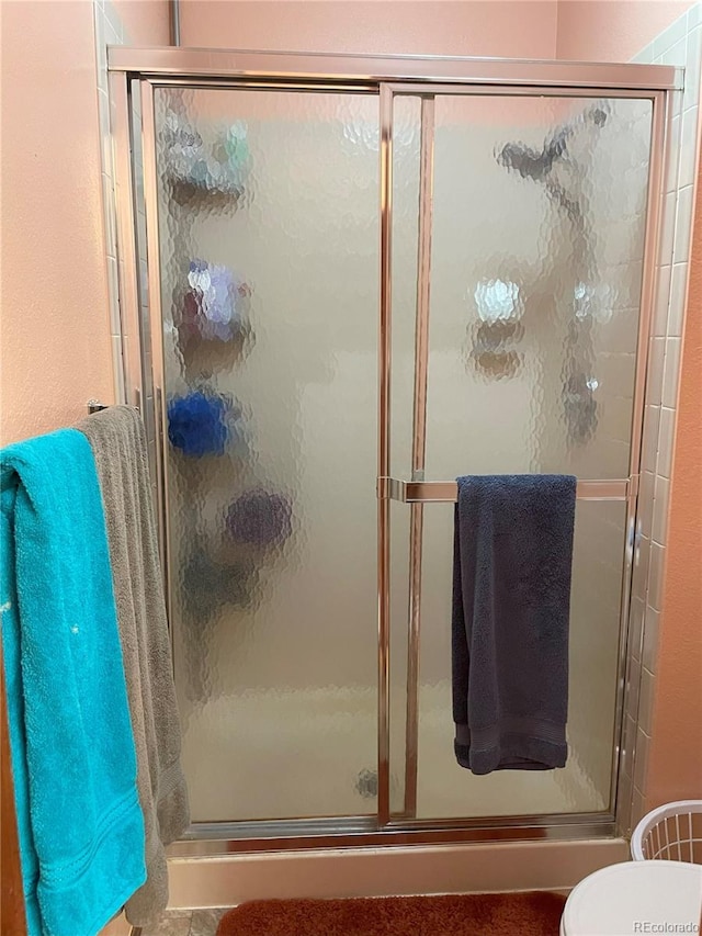 full bath featuring a stall shower