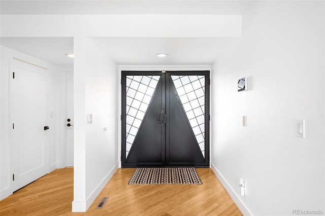 doorway featuring light wood-type flooring