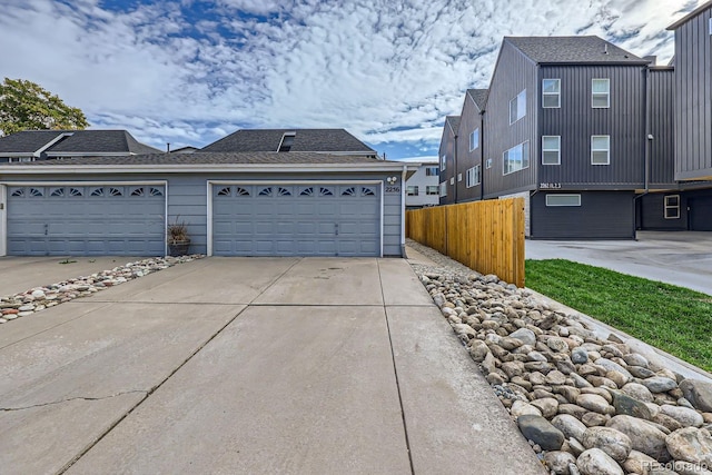 view of property exterior with a garage