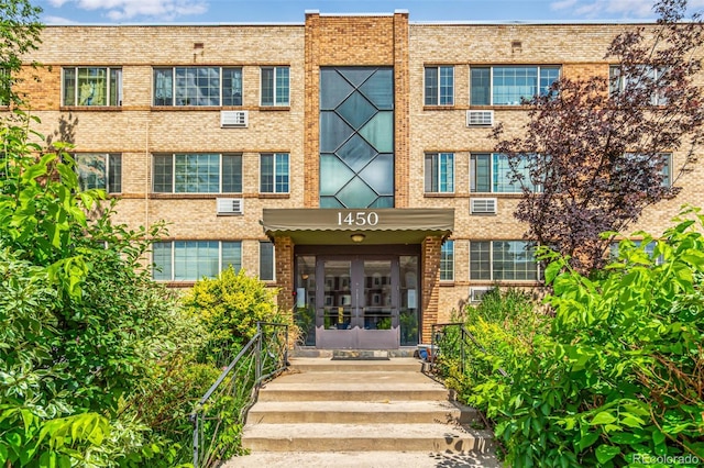 1450 Albion St Unit 204, Denver, CO 80220 - property entrance with french doors and brick siding