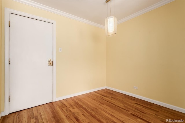 1450 Albion St Unit 204, Denver, CO 80220 - empty room featuring crown molding and wood finished floors