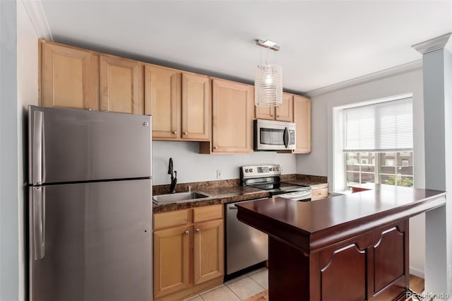 1450 Albion St Unit 204, Denver, CO 80220 - kitchen with appliances with stainless steel finishes, light brown cabinets, dark countertops, hanging light fixtures, and light tile patterned floors