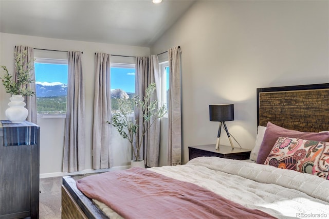 10617 County Rd 1, Florissant, CO 80816 - bedroom with lofted ceiling, baseboards, and recessed lighting