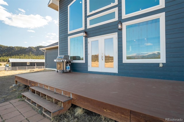 10617 County Rd 1, Florissant, CO 80816 - deck featuring a grill and french doors