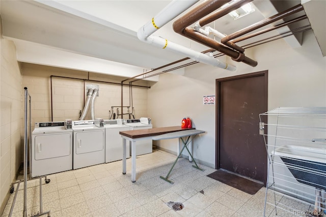 laundry area featuring washer and clothes dryer