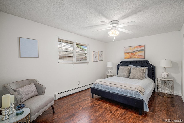 64 Nome Way Unit A, Aurora, CO 80012 - bedroom featuring a baseboard heating unit, wood finished floors, a textured ceiling, and a ceiling fan