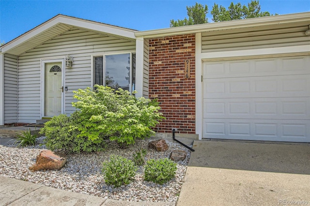 9146 W 89th Ct, Broomfield, CO 80021 - single story home with brick siding, driveway, and a garage