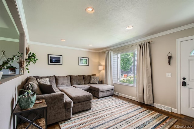 9146 W 89th Ct, Broomfield, CO 80021 - living area with wood finished floors, crown molding, recessed lighting, and baseboards