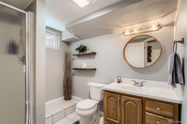 9146 W 89th Ct, Broomfield, CO 80021 - bathroom featuring tile patterned floors, vanity, toilet, and a shower stall