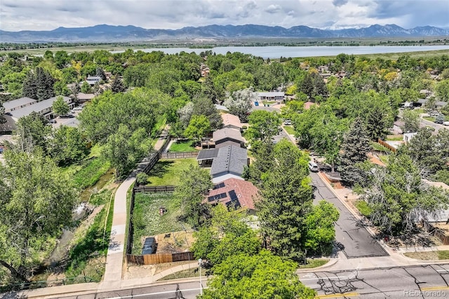 9146 W 89th Ct, Broomfield, CO 80021 - drone / aerial view of a water and mountain view