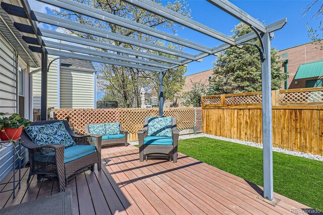 deck with a lawn, a pergola, fence, and an outdoor living space
