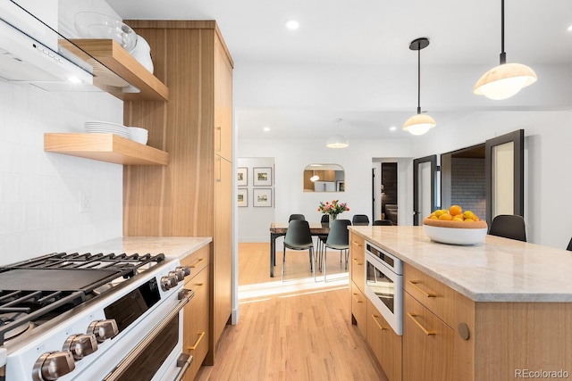 kitchen featuring range with two ovens, decorative backsplash, built in microwave, light wood-type flooring, and open shelves