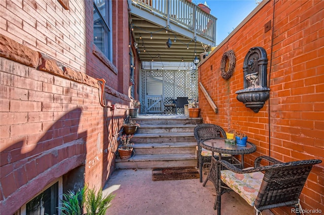 view of patio / terrace with a balcony