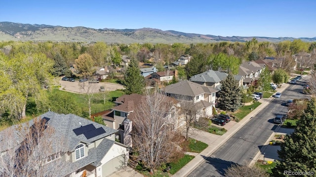 4059 Nevis St, Boulder, CO 80301 - aerial view of property and surrounding area featuring nearby suburban area and mountains