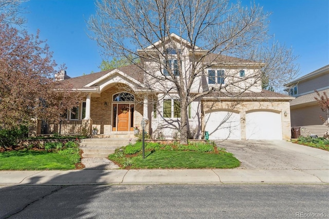 4059 Nevis St, Boulder, CO 80301 - view of front of property featuring brick siding and concrete driveway