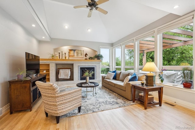 4059 Nevis St, Boulder, CO 80301 - living area featuring a tile fireplace, light wood finished floors, baseboards, a ceiling fan, and recessed lighting